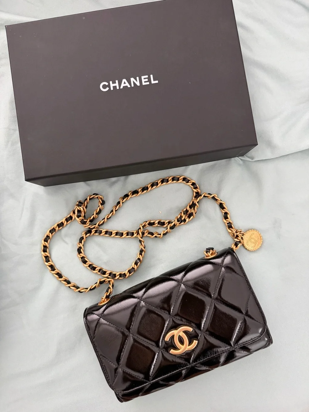 CHANEL Black Quilted Patent Leather Mini Flap with Gold Hardware